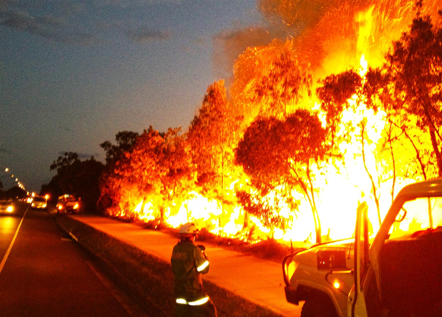Queensland Parks and Wildlife Service officers working controlled burn, Pine Ridge Conservation Park, 2013. Photo courtesy Josh Hansen, QPWS.