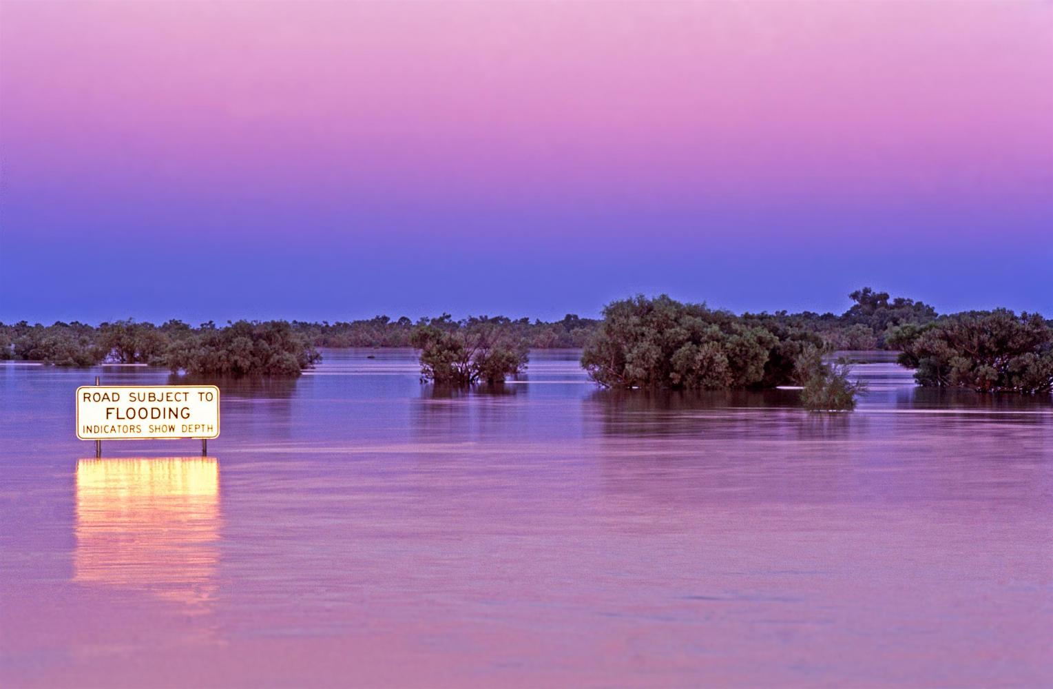 Near the same spot after flooding. A floodplain of 14,000 sq km fills with water, and the town of Windorah is cut off.