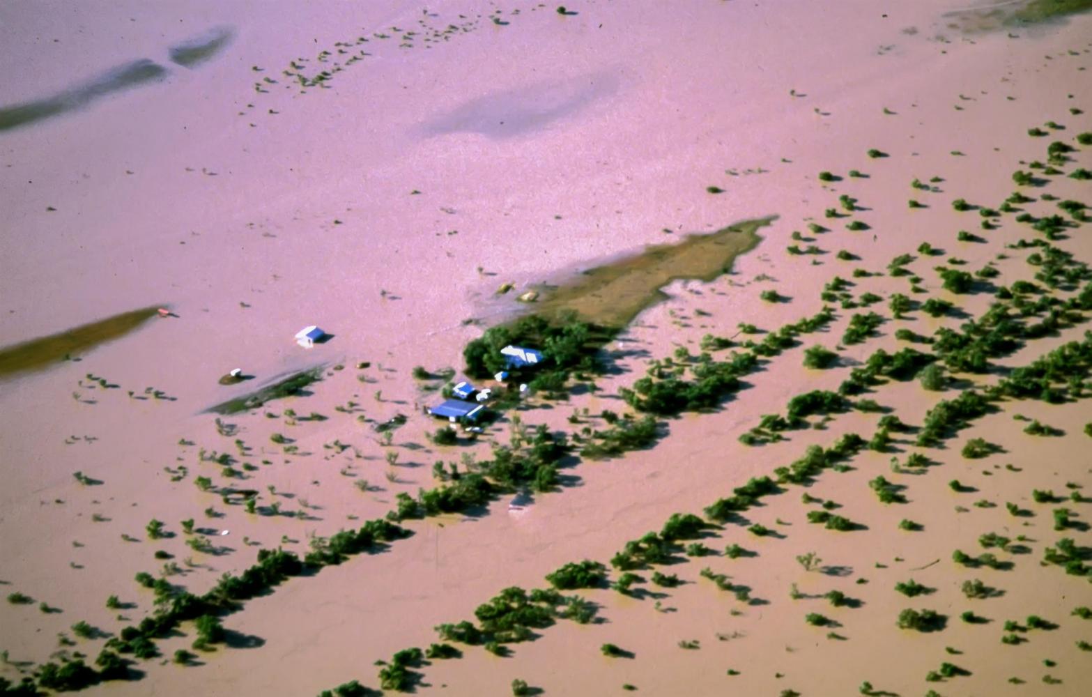 A flooded property on the edge of the Cooper.