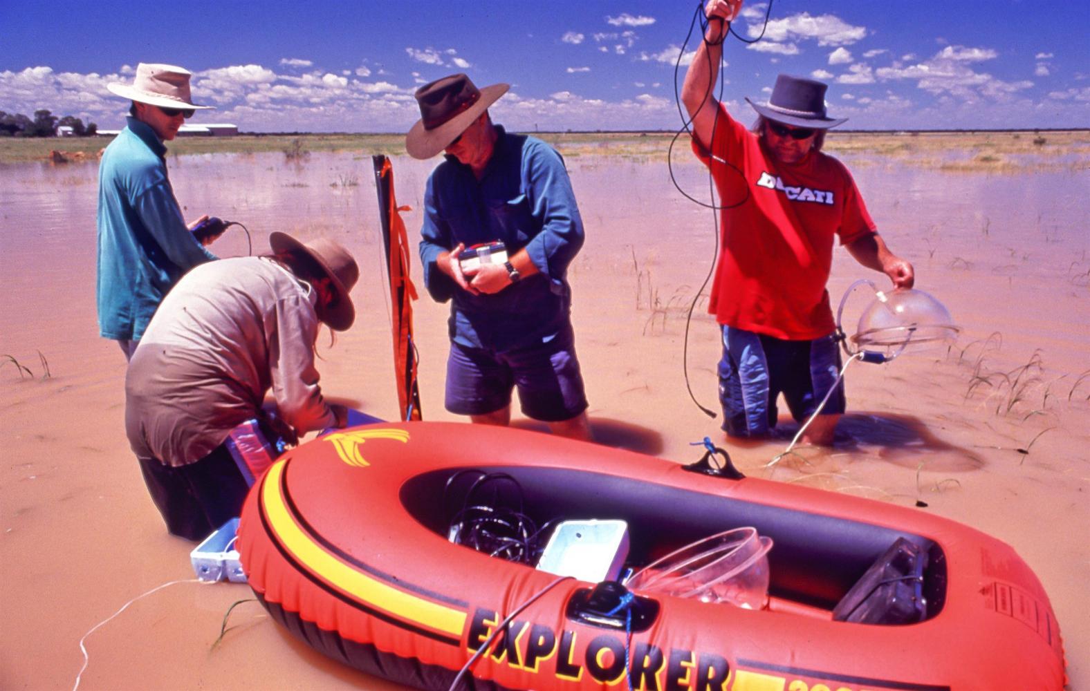 Setting up sampling points. The arrival of flood-bound nutrients brings an explosion of life, and rapid changes to the flood ecosystem.