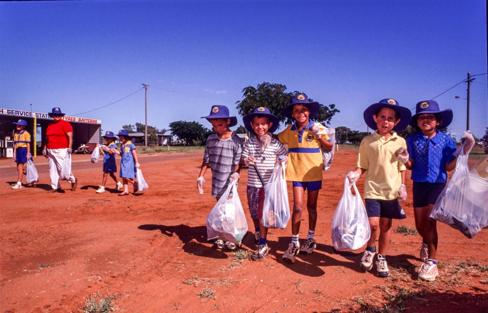 Local schoolkids on a town-wide rubbish collecting trip.